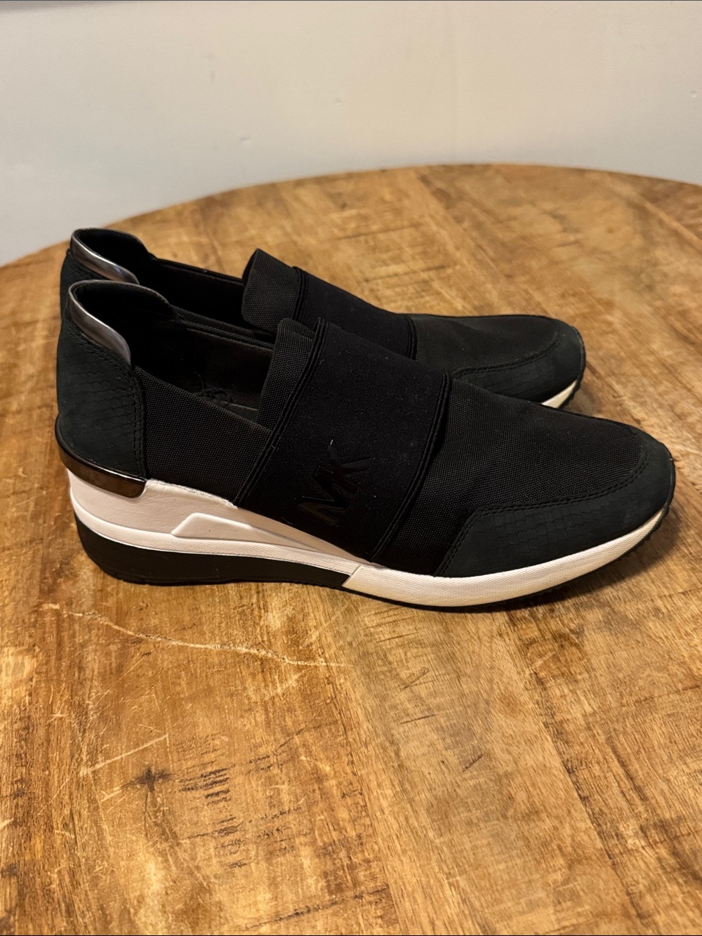 Michael Kors Black and White Slip-On Platform Sneaker